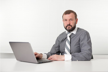 old business man with laptop