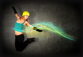 Woman jumping/dancing with glowing lines around her