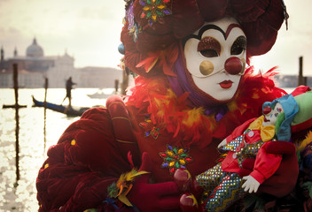 Clown with gondola in Venice