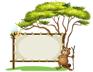 A beaver with a stick near a blank signage © GraphicsRF