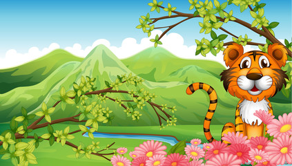 Obraz na płótnie Canvas Tygrys w pobliżu kwiatów przez góry