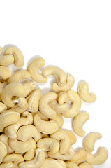 Raw cashew nuts isolated on white background