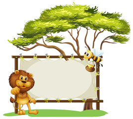 A lion and a bee near a big tree