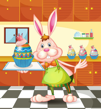 A bunny baking an egg-designed cupcakes