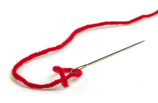 Sewing Needle And Red Thread