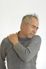 Obraz premium 肩が痛い男性