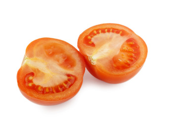 Two half of tomato isolated on white background