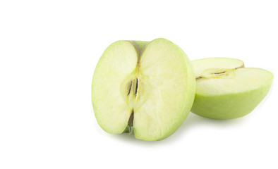 two halves of green apple isolated on white background