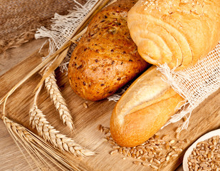 Fresh baked traditional bread and wheat