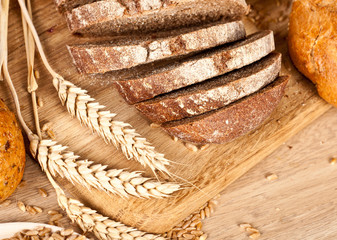 Fresh baked traditional bread and wheat