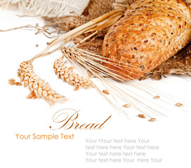 Fresh baked traditional bread and wheat