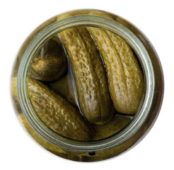 top view on salted cucumbers in glass jar