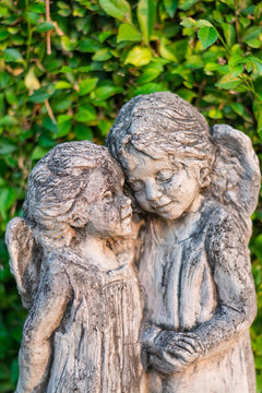 Ancient Angel Statues in the Forest