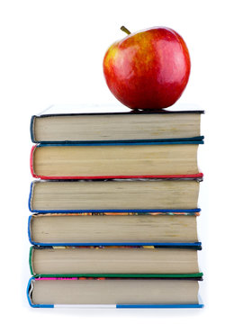 Fresh Apple on book pile