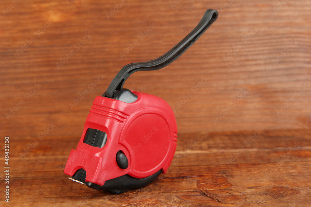 Poster Tape measure on wooden background