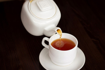 We give hot some tea