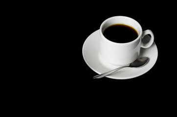 cup of coffee on a black background, horizontal