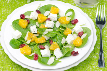 salad with spinach, feta and orange top view