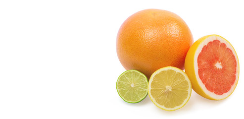 Image of a fresh whole lime, lemon and orange isolated on white