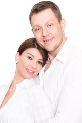 Obraz na płótnie Canvas Young and happy couple in front of white background
