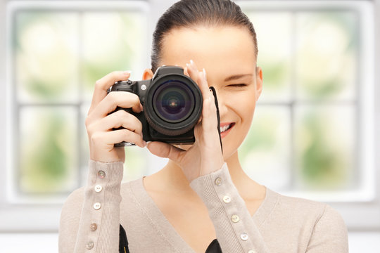 teenage girl with digital camera