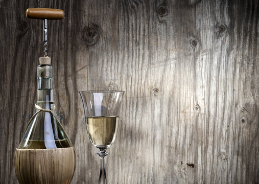 Bottle Wine glass  wooden background