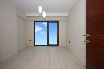 Fototapeta premium Empty room and the large window
