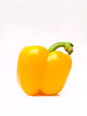 Fresh yellow bell pepper, Capsicum annuum, isolated on white bac