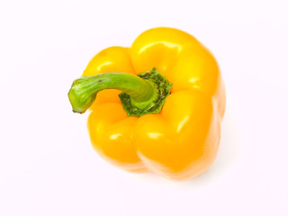 Fresh yellow bell pepper, Capsicum annuum, isolated on white bac