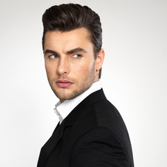 Closeup face of a fashion businessman in suit