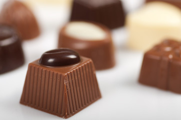 close-up of chocolates on a white background