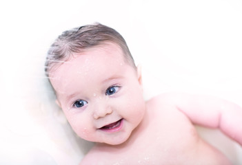 Funny baby under a shower