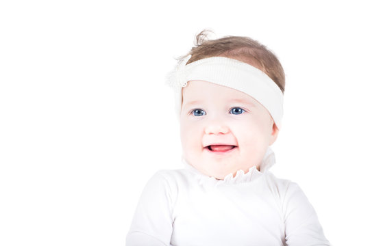 Sweet Baby Girl In A White Dress And White Hair Bow, Isolated On