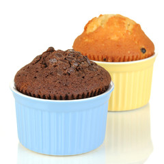 Cupcakes in bowls for baking isolated on white