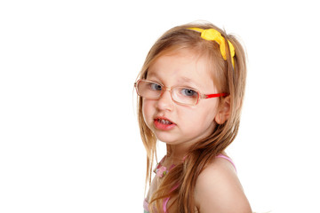 Portrait cute little girl in glasses isolated