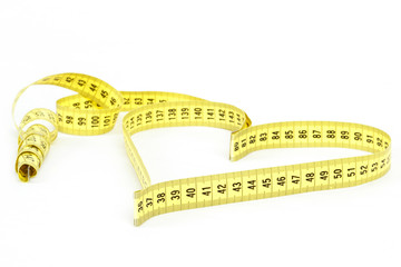 Tape measure heart shape - health, weight concept