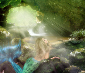Young blonde mermaid