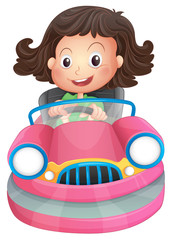 Fototapeta premium A young girl riding on a pink bumpcar