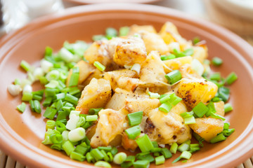 fried potatoes with cheese crust