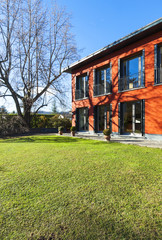 Fototapeta na wymiar beautiful house, outdoor, red facade