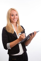 Young woman with checklist looking into camera