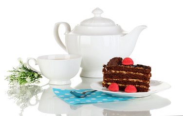 Teapot, cup of tea and delicious cake isolated on white