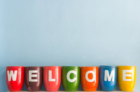 Welcome word on vase background blue sky wall