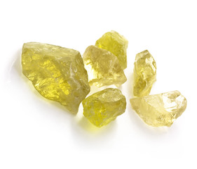 Rough citrines gems isolated on white background