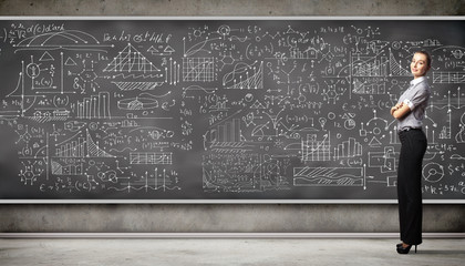 Business person against the blackboard © Sergey Nivens