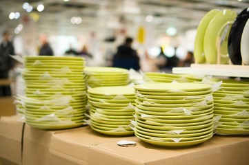 Bunch of color ceramic plates in store
