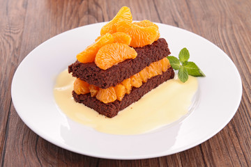 brownie with orange and custard