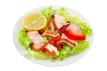 fish salad with lemon on the plate