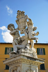 Pisa: angels and city symbol decoration at Miracles square