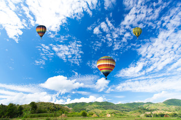 Hot air balloon over the field